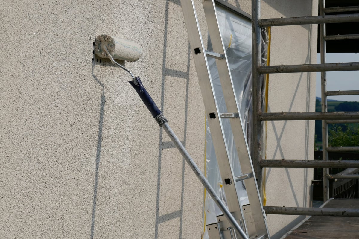 Painting walls. Repair and construction. Details of painting walls, roller, staircase, scaffolding and other tools for painting walls